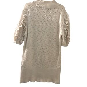 WHITE HOUSE BLACK MARKET Winter White sweater, sleeve ruffles, mock turtle neck.